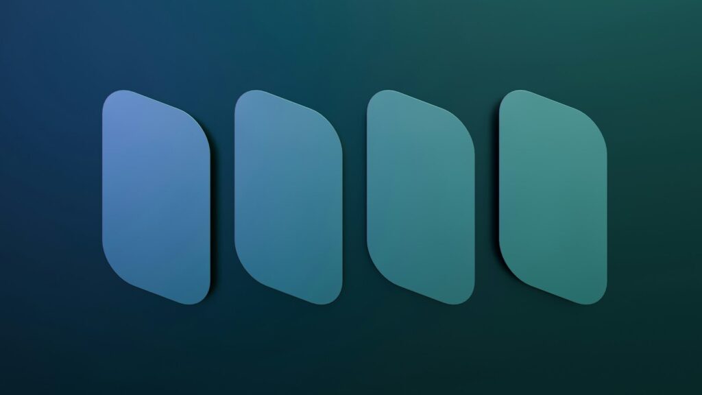 Four blue gradient shapes on a dark background